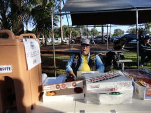 Tom AI4QP manning the doughnut table