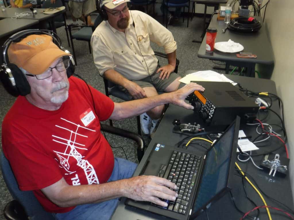 Tom W4CU operates the CW station with Mark KA4JVY